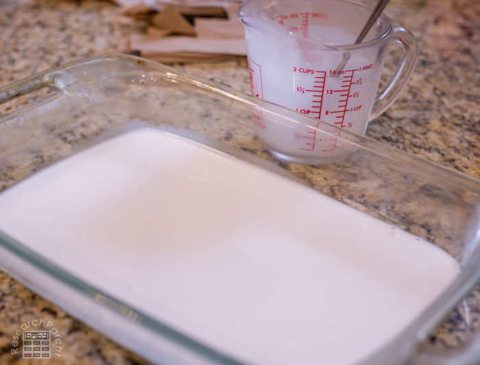 Place water glue mixture into a large shallow dish