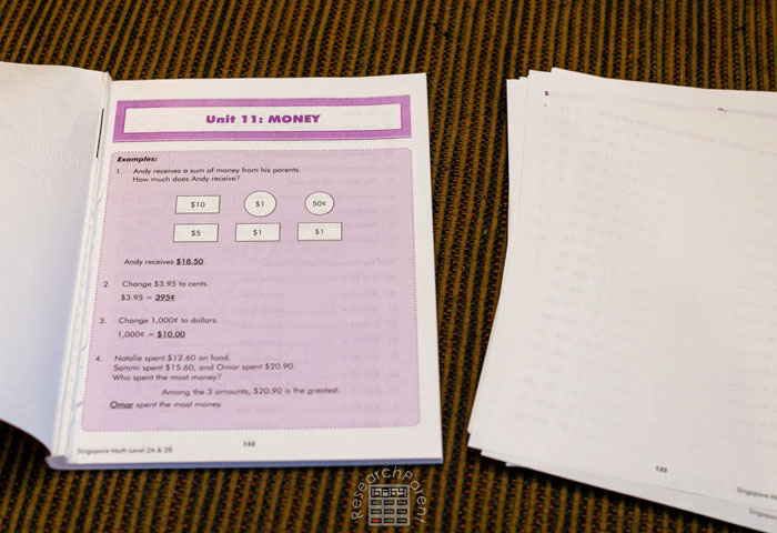 Rip out pages of workbooks for homeschool crate system