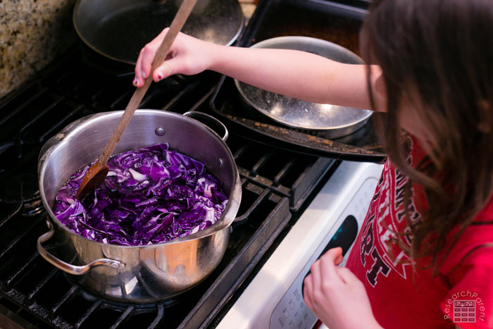 Stir the red cabbage in boiling water